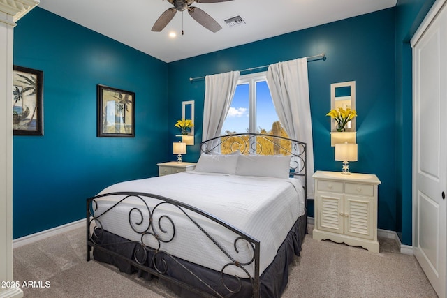 carpeted bedroom featuring ceiling fan