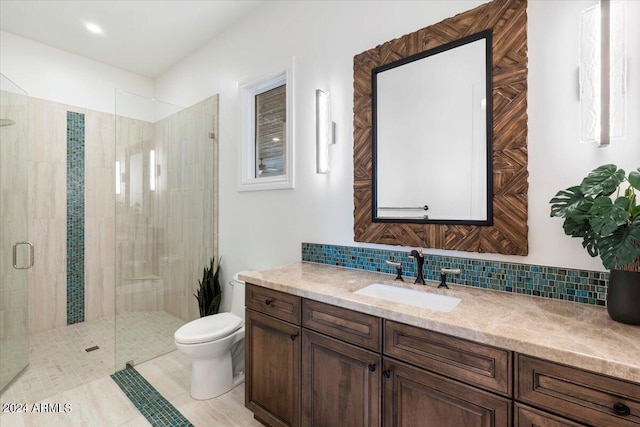 bathroom with vanity, an enclosed shower, decorative backsplash, tile patterned floors, and toilet