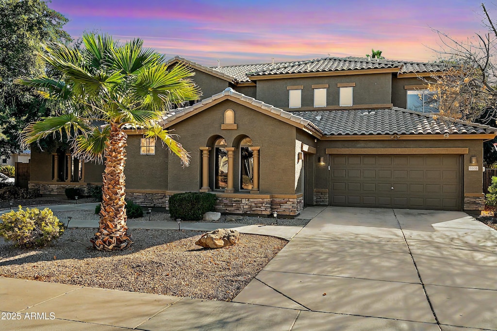 view of front of property featuring a garage