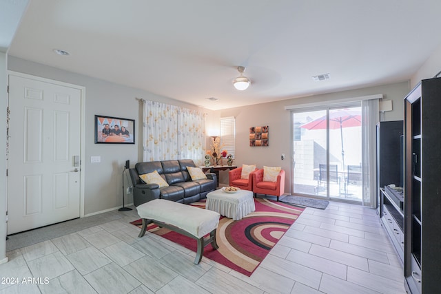 living room featuring ceiling fan