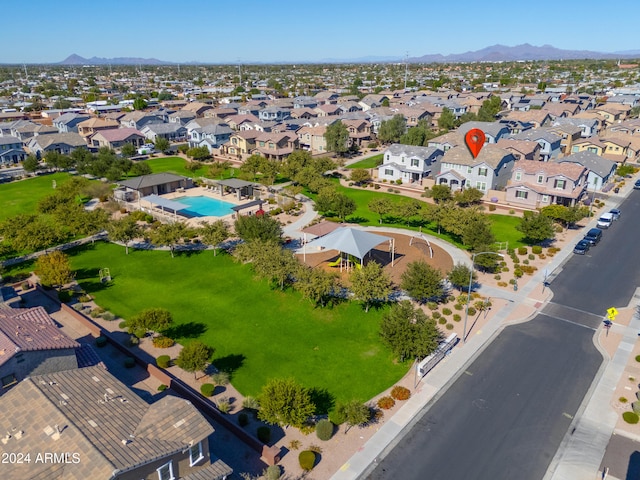 birds eye view of property with a mountain view