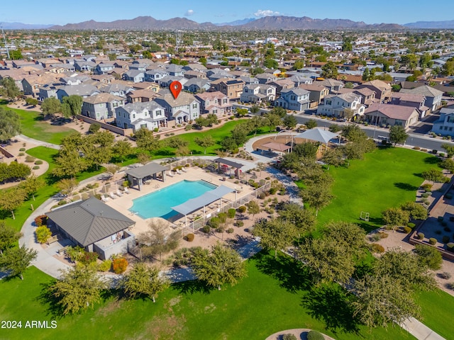 birds eye view of property with a mountain view