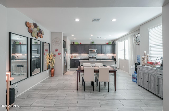 dining room featuring sink