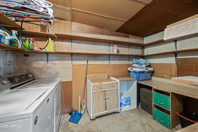 storage area with washer and dryer