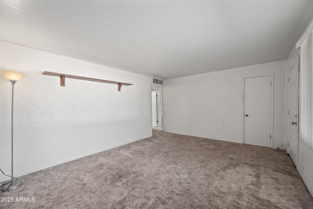 spare room with carpet flooring