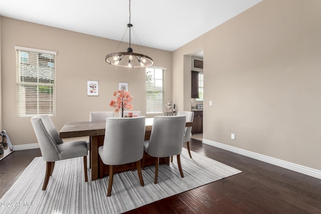 dining room with a chandelier and hardwood / wood-style floors