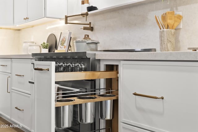 details featuring white cabinetry