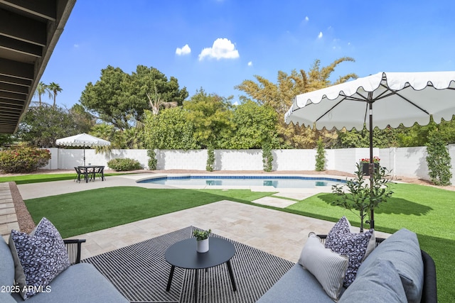 view of patio featuring a fenced in pool and a fenced backyard