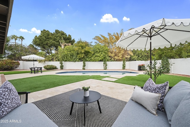 view of patio featuring a fenced in pool and a fenced backyard