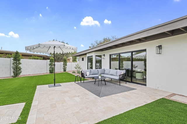 view of patio / terrace featuring outdoor lounge area and fence