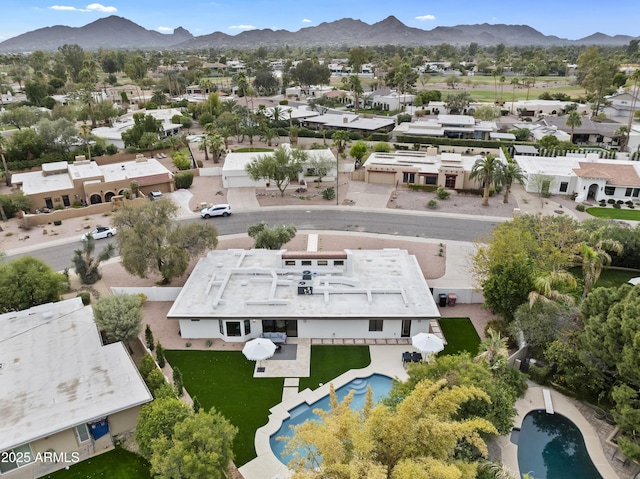 bird's eye view with a residential view and a mountain view