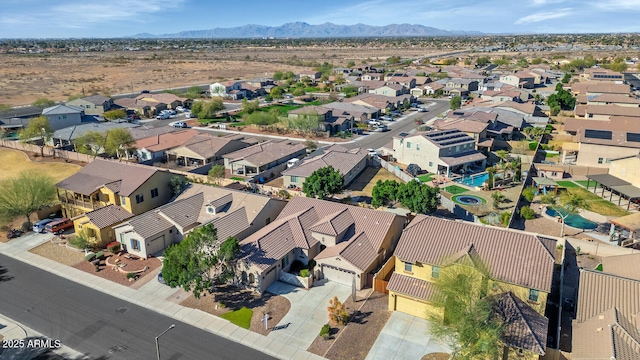 bird's eye view featuring a residential view and a mountain view