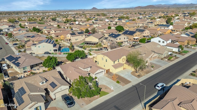 aerial view featuring a mountain view and a residential view