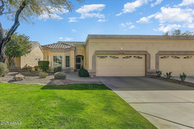 view of front facade featuring a garage and a front lawn