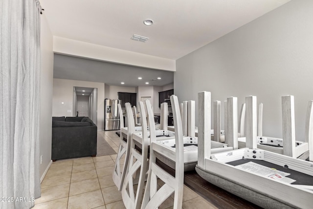 dining space with visible vents, recessed lighting, and light tile patterned flooring