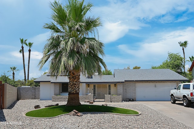 single story home with a garage