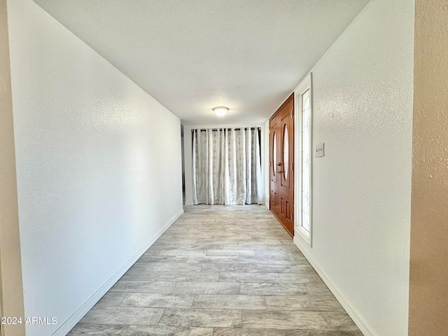 hall featuring light hardwood / wood-style floors