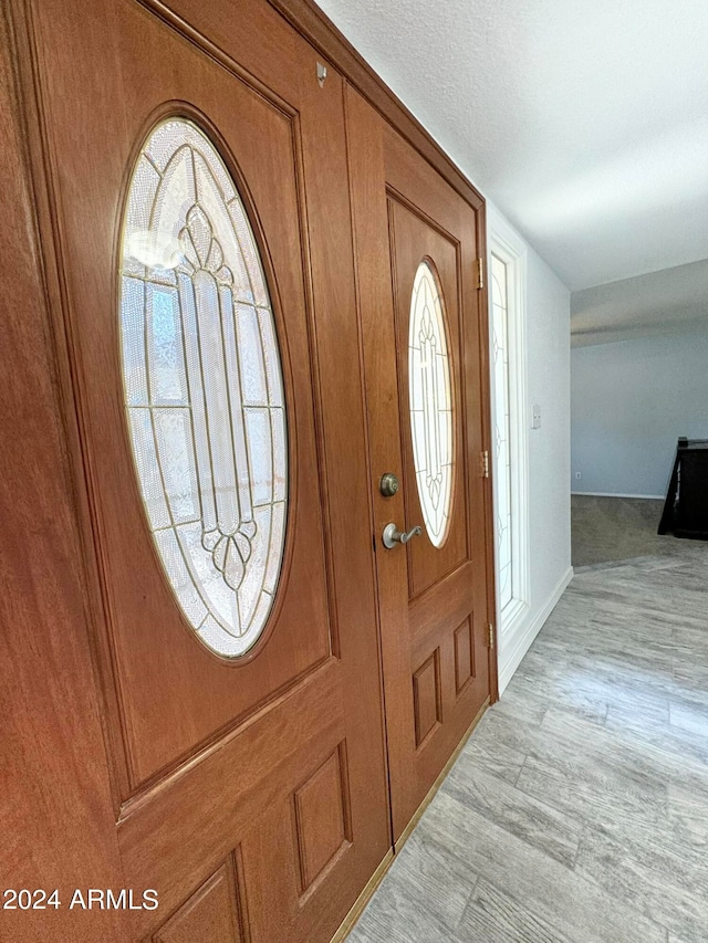 entrance foyer featuring light hardwood / wood-style floors