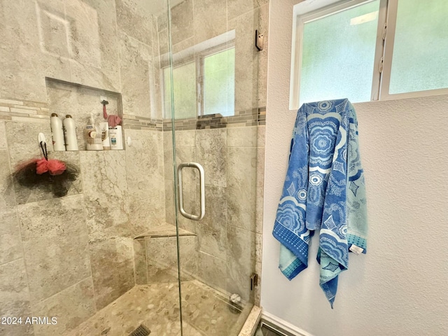 bathroom featuring walk in shower