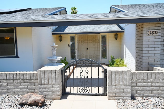 doorway to property featuring covered porch