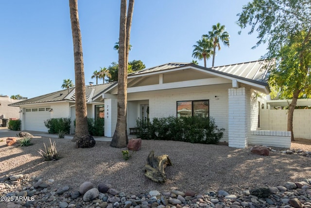 single story home with a garage