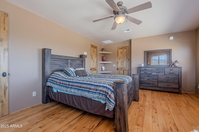 8606 E Arroyo Seco Rd, Scottsdale, AZ 85266 - bedroom featuring wood-type flooring and a ceiling fan
