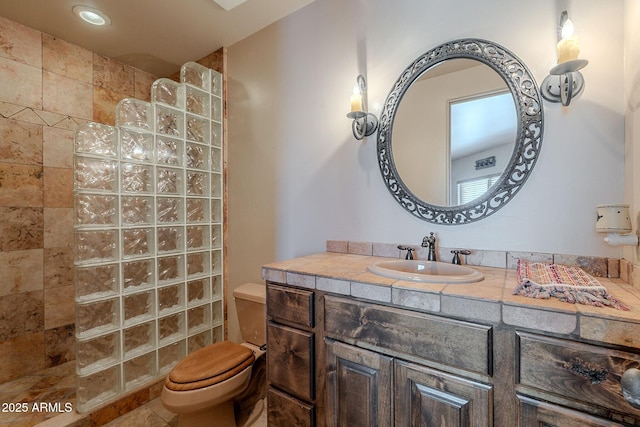 8606 E Arroyo Seco Rd, Scottsdale, AZ 85266 - bathroom with a walk in shower, toilet, and vanity