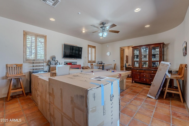 8606 E Arroyo Seco Rd, Scottsdale, AZ 85266 - kitchen featuring plenty of natural light, a ceiling fan, recessed lighting, and light tile patterned floors