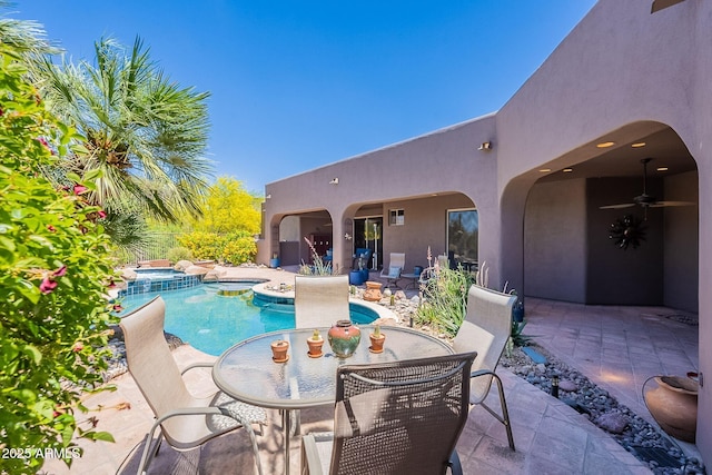 8606 E Arroyo Seco Rd, Scottsdale, AZ 85266 - view of pool with a patio, a pool with connected hot tub, and outdoor dining area