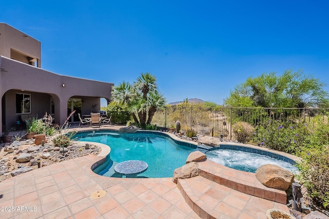 8606 E Arroyo Seco Rd, Scottsdale, AZ 85266 - view of swimming pool featuring a patio, fence, a mountain view, and a pool with connected hot tub