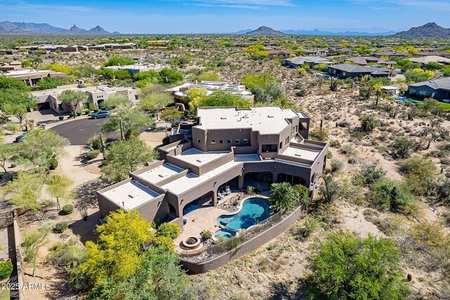 8606 E Arroyo Seco Rd, Scottsdale, AZ 85266 - aerial perspective of suburban area with mountains and a pool area