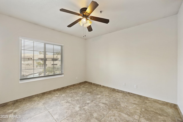 unfurnished room featuring ceiling fan