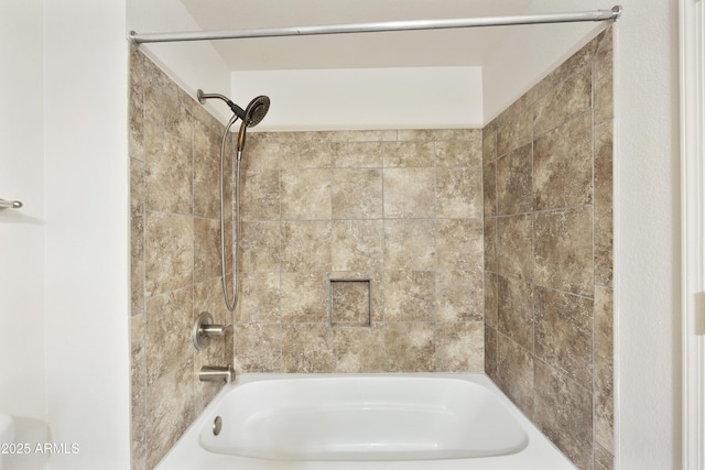 bathroom featuring shower / washtub combination