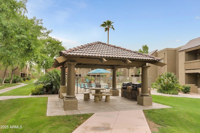 view of home's community with a yard, a patio, and a gazebo