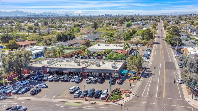 birds eye view of property featuring a mountain view