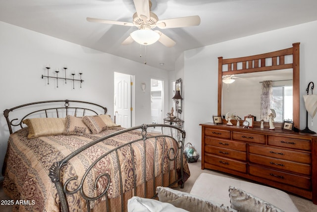 bedroom featuring light carpet and ceiling fan