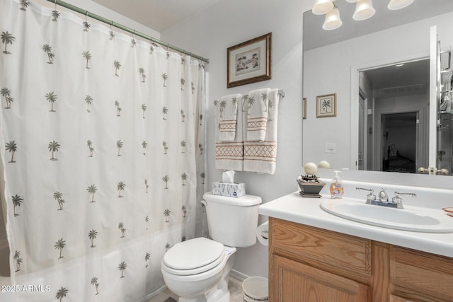 full bathroom featuring vanity, toilet, and shower / bath combo with shower curtain