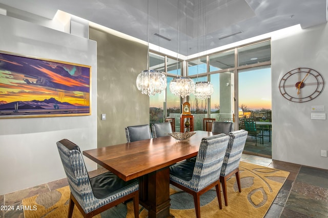 dining area with a wall of windows