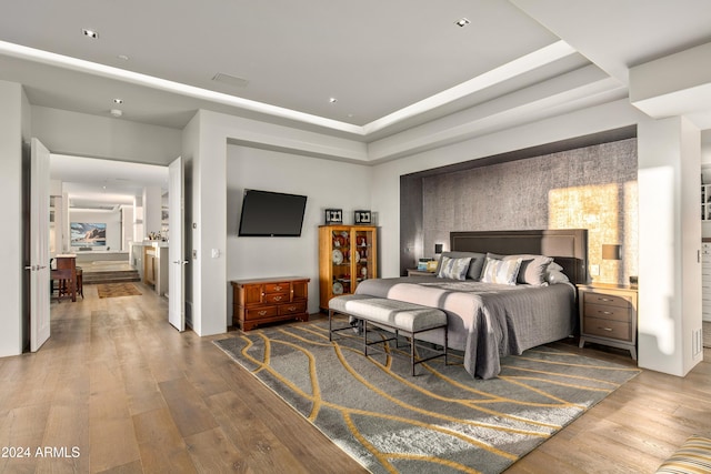 bedroom featuring hardwood / wood-style flooring