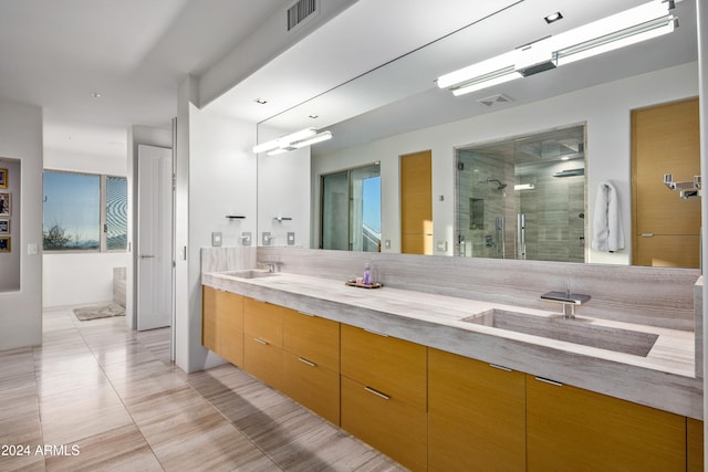 bathroom featuring vanity, tile patterned floors, and independent shower and bath