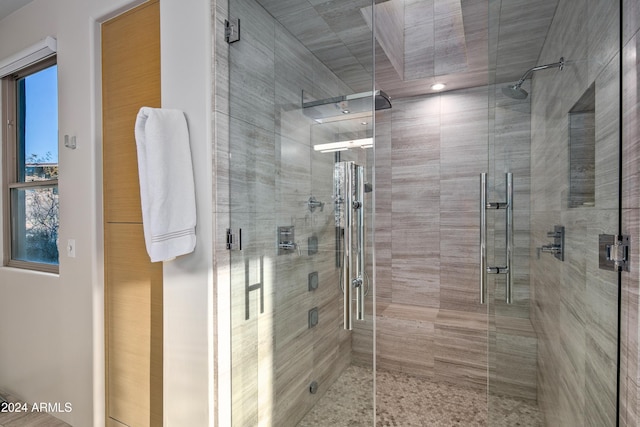 bathroom featuring an enclosed shower