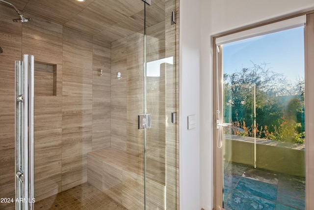 bathroom featuring an enclosed shower