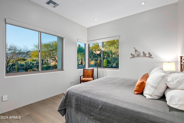 bedroom featuring hardwood / wood-style floors