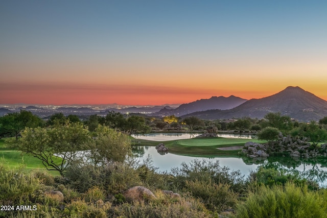 view of property's community featuring a water and mountain view