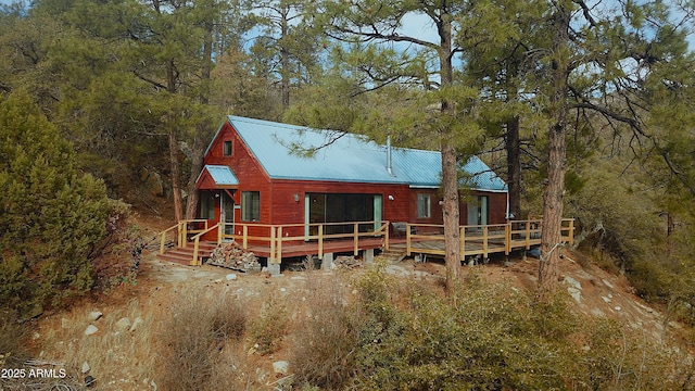 6358 E Mountain View Rd, Crown King, AZ 86343 - rear view of property with metal roof, a wooden deck, and a view of trees