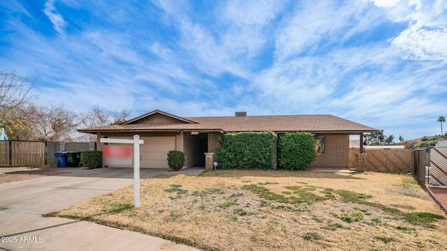 single story home featuring a garage