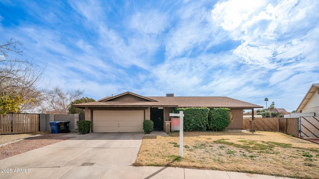 ranch-style home with a garage