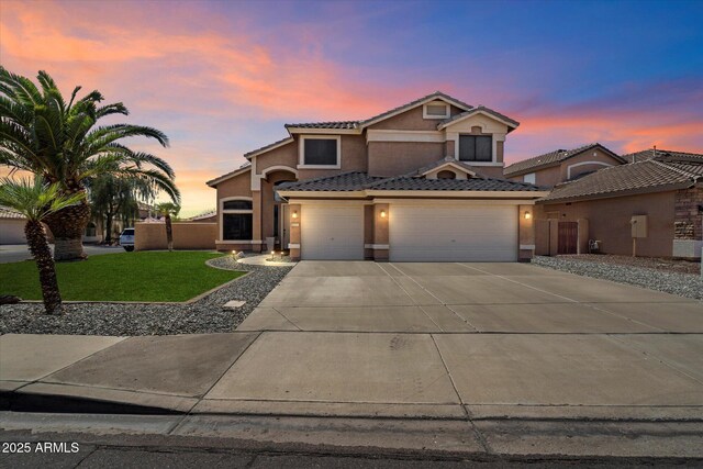25818 N 68th Ave, Peoria, AZ 85383 - view of front of home featuring a tile roof, a garage, driveway, and stucco siding