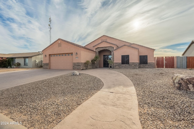 view of front of property featuring a garage