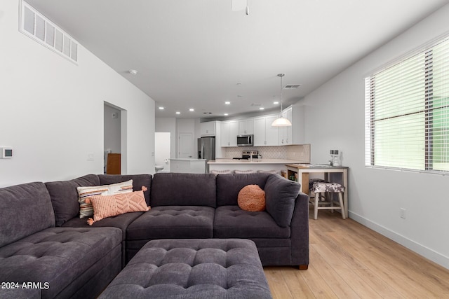 living room with light wood-type flooring